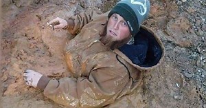 Tennessee man rescued from chest-deep mud
