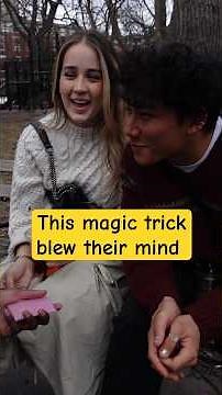 Street magician shows strangers magic tricks