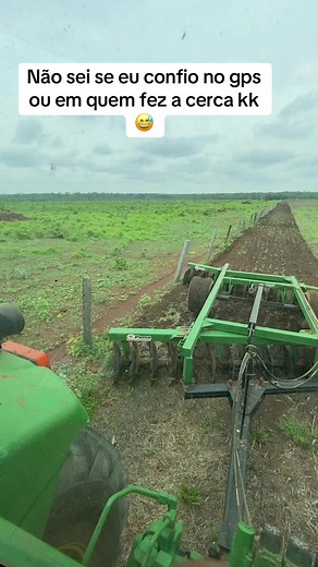 John Deere Tractor Plowing Field in Action