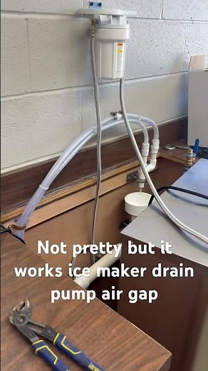 Installed ice maker drain pump with air gap