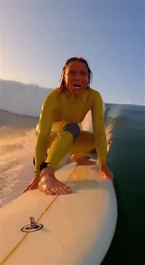 Woman Surfs Giant Wave at Sunset!