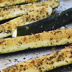 ROASTED ZUCCHINI - Learn how to cook zucchini the absolute best way! Roasted Zucchini is an easy, oven baked recipe perfect all year round. Golden, roasted summer squash is flavored with garlic and seasonings for a healthy side dish everyone will devour! RECIPE: https://www.mamagourmand.com/roasted-zucchini/ | MamaGourmand - Gluten Free