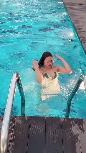 Elegant Poolside Escape in a Green Bikini