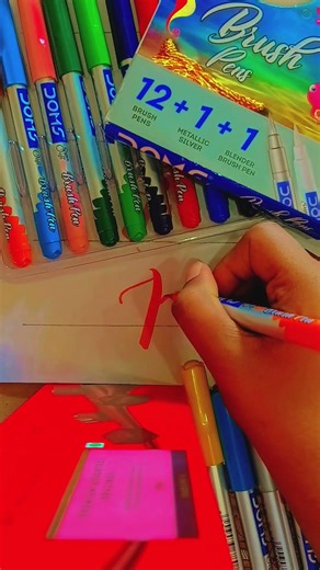 Drawing the letter "p" in caligraphy using orange brush pen ❤️