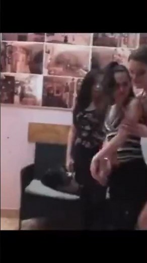 tall woman lift and carry 2 girls