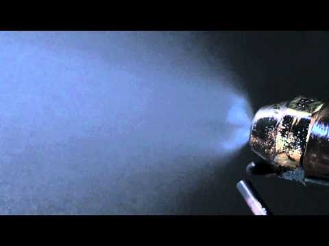 How the fuel oil sprays from the nozzle in the oil burner