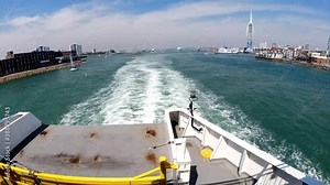 Time lapse view from the rear of a car ferry traveling across the solent from Portsmouth to the Isle Of Wight, UK. Stock Video
