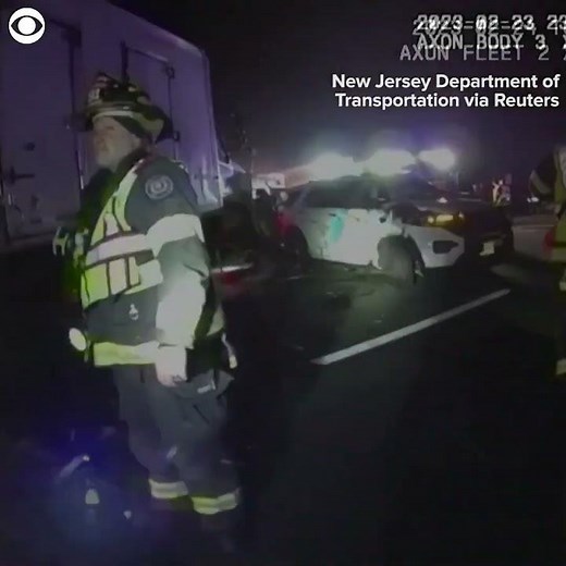 Dash cam captures moment tractor-trailer slams into unoccupied police vehicles