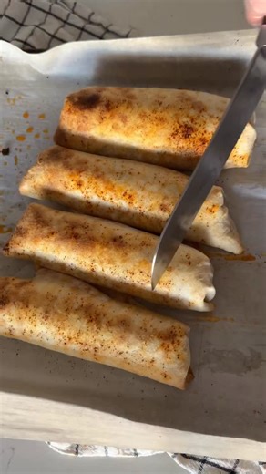 Crispy buffalo chicken wraps. Here’s what you’ll need: Rotisserie chicken, de-boned and shredded 1 block cream cheese, softened 1 cup mozzarella cheese, shredded 1 cup cheddar cheese, shredded 3 green onion, thinly sliced Flour tortillas Ancho chili powder Olive or avocado oil Buffalo sauce: 1/2 cup franks red hot 3 tbsp honey 4 tbsp unsalted butter, melted 1 tsp garlic powder 1 tsp smoked paprika Salt to taste In a small bowl, combine all sauce ingredients and whisk. In a large bowl, combine ch