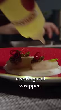 766K views · 10K reactions | At Michelin-starred restaurant Clover Hill, chef Charlie Mitchell decided to “treat the fluke like it was a spring roll wrapper.” The flaky white fish is cured for 24 hours before it’s pressed, rolled, and topped with caviar. | Eater | Facebook