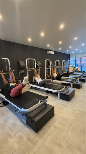 The Fit In on Instagram: "Pilates Tower: The Hunger Games. May the core strength be ever in your favor. The Tower is a fan favorite because it’s the best of both worlds— ✨ mat-level core control ✨ reformer-style spring support ✨ and just enough challenge to expose who’s really locked in In our Pilates Reformed classes, we mix it all up—tower, chair, reformer energy—so you get support when you need it and challenge when you’re ready. Some will fall. Some will shake. A few will remain standing. 🎯