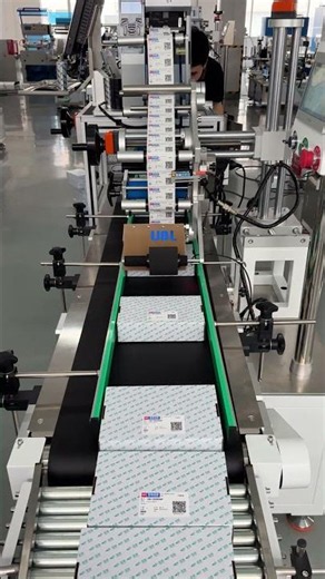 Continuous Top Labeling Machine for High Volume