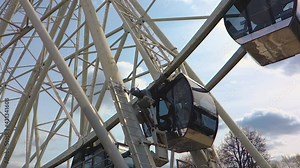 Ferris Wheel attraction. The mechanism of rotation of the wheel close-up.