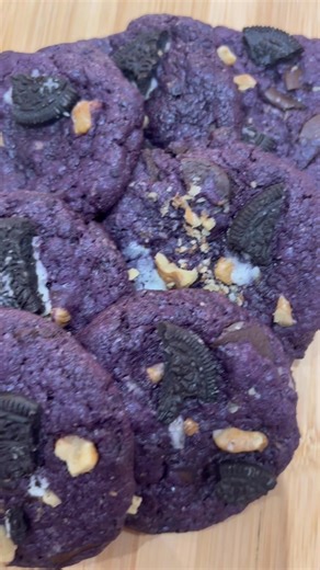 Can't decide? Don't! Our fresh-baked trio is here to satisfy every cookie craving. Sink your teeth into classic, gooey Chocolate Chip, rich Red Velvet, or the delightfully unique Ube! Perfect for sharing (or not ). | The Artisan Bakery & Cake Studio | Facebook