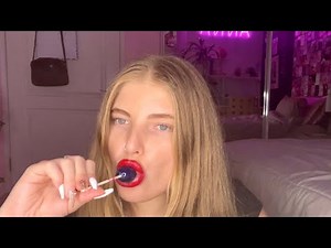 ASMR applying lipstick and eating candy🍭(kissing, chewing, crunching noises)