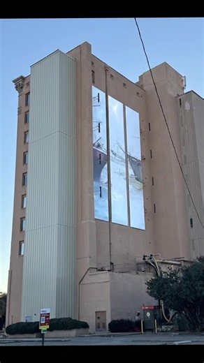 Cities reveal what they value by what they place in public view. In downtown Pensacola, walls were not left neutral. They were given responsibility. Along Palafox Street and its surrounding streets, large-scale murals function as an open system of memory—where history, culture, and creative risk are embedded directly into the built environment. Brick becomes record. Scale becomes emphasis. Through initiatives such as POP:Murals, stewarded by the UWF Historic Trust, archival imagery was moved fro