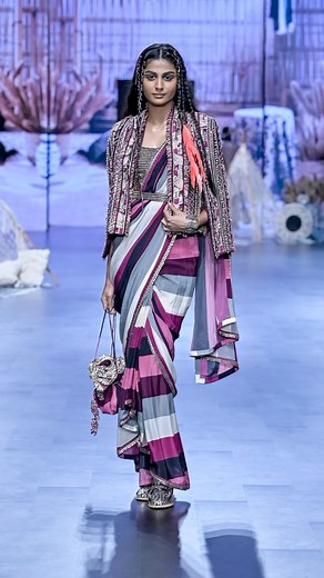 Introducing ‘Safar’ - Our Exclusive 10th Anniversary Special Collection. From our eclectic archive, we’ve reimagined iconic styles, injecting our signature blue with deep Merlot and ethnic hues, exploring luxe bohemian textures and modern silhouettes. Join us in paying homage to an amazing brand journey. . . @nexaexperience @lakmeindia @fdciofficial @reliancebrandsltd @r1seworldwide . . #SVA #10YEARSOFSVA #SAFAR #LAKMEFASHIONWEEK #SONAMMODI #PARASMODI #FASHIONJOURNEY | SVA