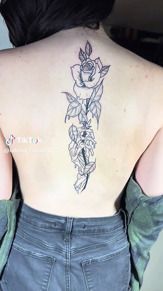 Skeleton hand holding a 🌹 Placement was really dope for this tattoo! #skeletonhandtattoo #rosetattoo #skeletonhandholdingarose #backtattoos #lightshading #goldstripetattoo #northparksandiego #universityavesandiego #sandiegotattooartist #sdtattooartist #cali #daygo #gettattooed #getinked #bookyourappointment