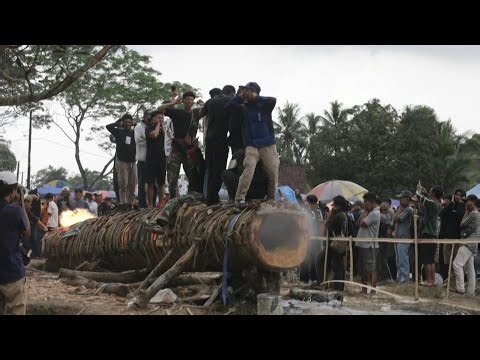 Indonesians fire wooden cannons in traditional post-Eid celebrations | AFP