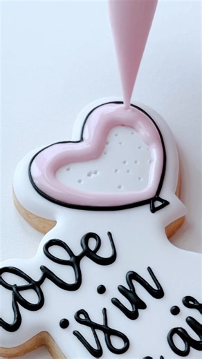 💕 MY DECORATED VALENTINE COOKIE FAQ ANSWERS 💕 Royal icing font is still not the easiest thing for me but I wanted to answer some of the questions I get the most, in hopes that it will help you with your cookie decorating! ❓What consistency do you use for your font ❓ 👉 I use a consistency that is a tad bit thicker than my outline icing consistency. If you need more help with your royal icing consistency, be sure to check out my step-by-step tutorial on my Beka Claire YouTube channel! ❓ Do you 
