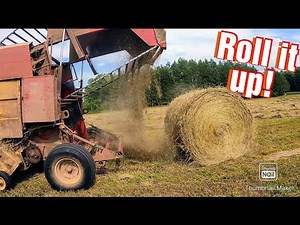Raking and Round Baling Hay
