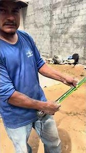 Bricklayer calculates age with measuring tape #construction