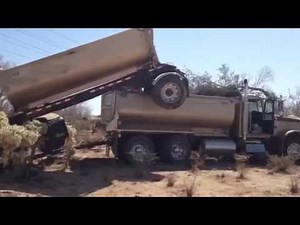 Video: Driver crashes tandem dump truck NW of Tucson