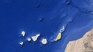 Why does Spain own Canary Islands?