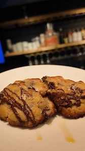 ¡TapaVino! on Instagram: "Collaboration Dessert with The Jewel Foods: A Delightful Treat Indulge in a heavenly dessert that perfectly marries the classic comfort of homemade chocolate chip cookies with a gourmet twist- a warm, freshly baked chocolate chip cookie, elegantly drizzled with premium Titin Olive Oil and sprinkled with a touch of flaky salt, served alongside a refreshing glass of ice-cold milk. Homemade Chocolate Chip Cookies: Soft, chewy, and packed with rich chocolate chips, these co