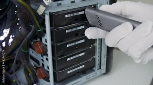 Remove dust from hard drives with a vacuum cleaner. Service for cleaning and repair of computer equipment.