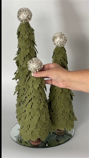 DIY Felt Christmas Trees . . . #christmas #feltcrafts #handmade #christmastree #merrychristmas #christmastime #winter #christmasdecor #christmasdecorations #christmasiscoming #xmas #christmaslights #feltcrafts #holidays #homedecor #handmade #gift #gifts #holiday #happyholidays | The Crafty Blog Stalker