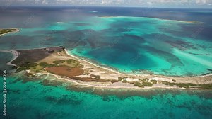 The turquoise waters and sandy beaches of los roques archipelago in venezuela, clear sky, aerial view