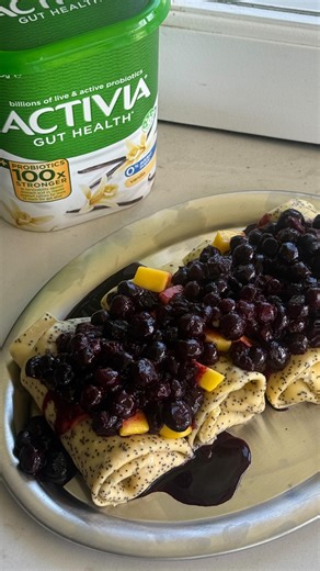 Sophie Fisher on Instagram: "Blueberry poppyseed crepes with whipped yoghurt - made these using @activiaaustralia vanilla probiotic yoghurt to create the fluffiest filling. Unlike some other regular yoghurts, Activia is proven* to support gut health (and it tastes delicious!!) Crepes 1.5 cups plain flour 1.5 cups milk 3 eggs 2 tbsp sugar-free maple syrup Zest of 1 lemon 3 tbsp poppy seeds 1 tbsp butter, melted Whipped Yoghurt 500 g Activia probiotic yoghurt Blueberry Compote 450 g frozen blueber