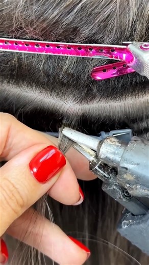 This girl gets artificial hair extensions soldered into her hair #shortsvideo