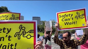 Demonstrators hold vigil, rally for UC Berkeley professor killed in Oakland crosswalk