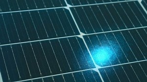 Solar battery, solar panel - a combination of photoelectric converters (photocells) - semiconductor devices that directly convert solar energy into direct electric current. Shot in motion. Closeup