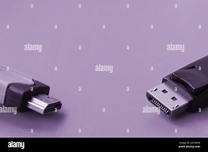 Audio video HDMI computer cable plug and 20-pin male DisplayPort gold plated connector for a flawless connection on a purple background Stock Photo - Alamy