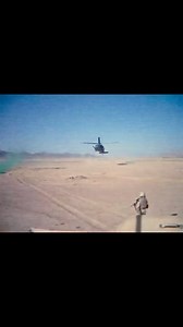 HH60 makes dust landing during rescue mission in combat. | Two to Fly