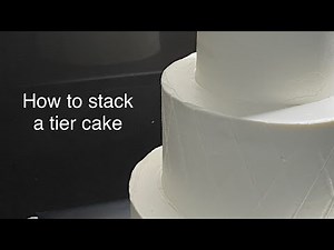 How to stack a tier cake | Three tier cake soft icing video tutorial