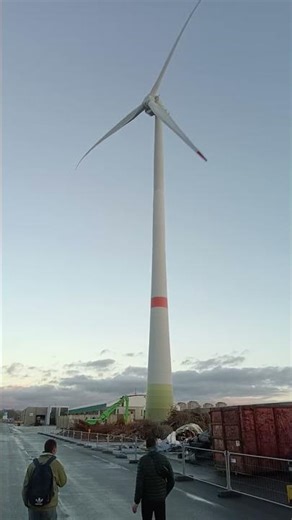 People are small fry compared to the grandiose structures #windmill