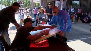 After Michael Crabtree finished signing at Red Raider Outfitter, he came over to our weekly Radio Show, the Rockin' Pregame on 101.1 The Beard and talked to us. Crabtree was glad to be back in Lubbock. He talked to us about entering the Texas Tech Ring of Honor, how he came to Texas Tech because of Bobby Knight and what Graham Harrell and he talked about before the Catch November 1,2008 vs. Texas. On a side note, Crabtree signed everything, He was smiling the whole time. He talked to everyone an