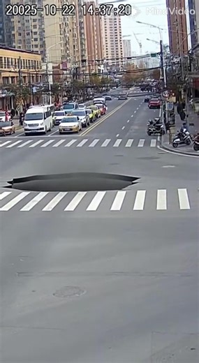 SHOCKING! Road Sinks Massive Hole - CCTV Captures Cars Destroyed 🤯 Terrifying moment caught on CCTV! Watch as a busy city road suddenly collapses into a massive sinkhole, instantly destroying multiple vehicles in a crowded area. This chilling footage is a stark reminder of urban infrastructure risks. Full footage of the disaster unfolding. Share to raise awareness about ground stability and city safety! #RoadCollapse #sinkhole #viralvideochallenge #CCTVCamera #caughtoncameraman #BreakingNews #d