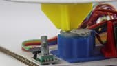 Rotary encoder and stepper motor view that is controlled by micro...