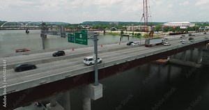 Interstate 30 I-30 traffic crosses Arkansas River Bridge, Little Rock, AR - Aerial slide left