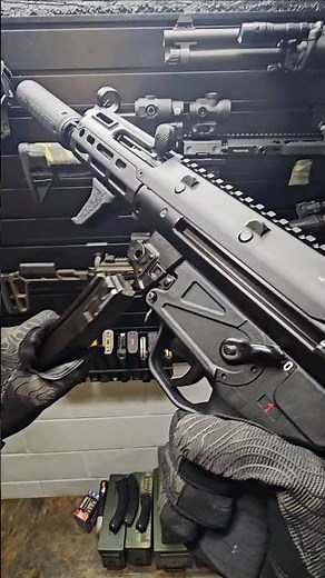 MP5 clone with the B&T Vers36 Ti suppressor and tri-lug adapter.