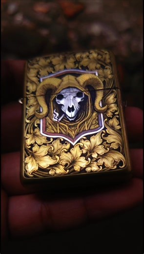 update on the custom engraved zippo by @windu now to add the blacksheep on top and some more scrollwork down the sides ​What started as the Smokin’ Token—my favorite hand-poured silver round—has officially transcended the forge. The hooded ram, the decomposing skull, and the steady cherry of that cigarette have been pulled from the mold and etched into brass. ​This isn’t just a lighter; it’s The