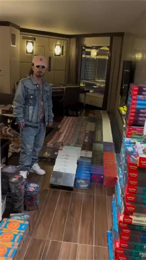 🎰🏨🎴 Pokémon Scalper Turns His Las Vegas Hotel Room into a Pokémon Card Store 🎴🏨🎰 What happens in Vegas… apparently turns into a pop-up card shop. The scalper checks into his hotel room with one suitcase for clothes and four rolling cases full of Pokémon inventory 🧳🎴. Booster boxes stacked like slot machines, slabs laid out on the desk, ETBs lining the windowsill where the neon lights bounce off the plastic wrap all night ✨📦. He flips the Do Not Disturb sign immediately—this is a busines