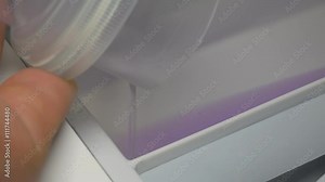 Liquid detergent adding to laundry machine 4K 2160p UHD footage - Washing machine preparing for color laundry 4K 3840X2160 UHD video Stock Video