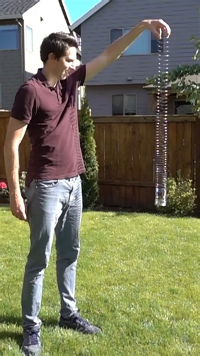 The physics behind the floating slinky 🌀 #experiment #science #physics #slinky #floating #reels | The Action Lab