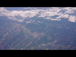 Airplane fly over the Alps 4K 2019 August